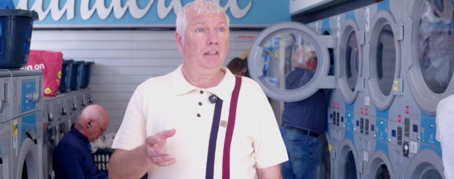 Rob Bush speaking to camera on the shop floor at Copnor Cleaners